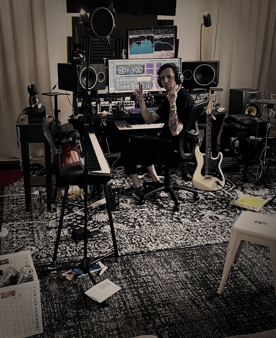 Jacob Wilkes at the desk in his Sydney studio